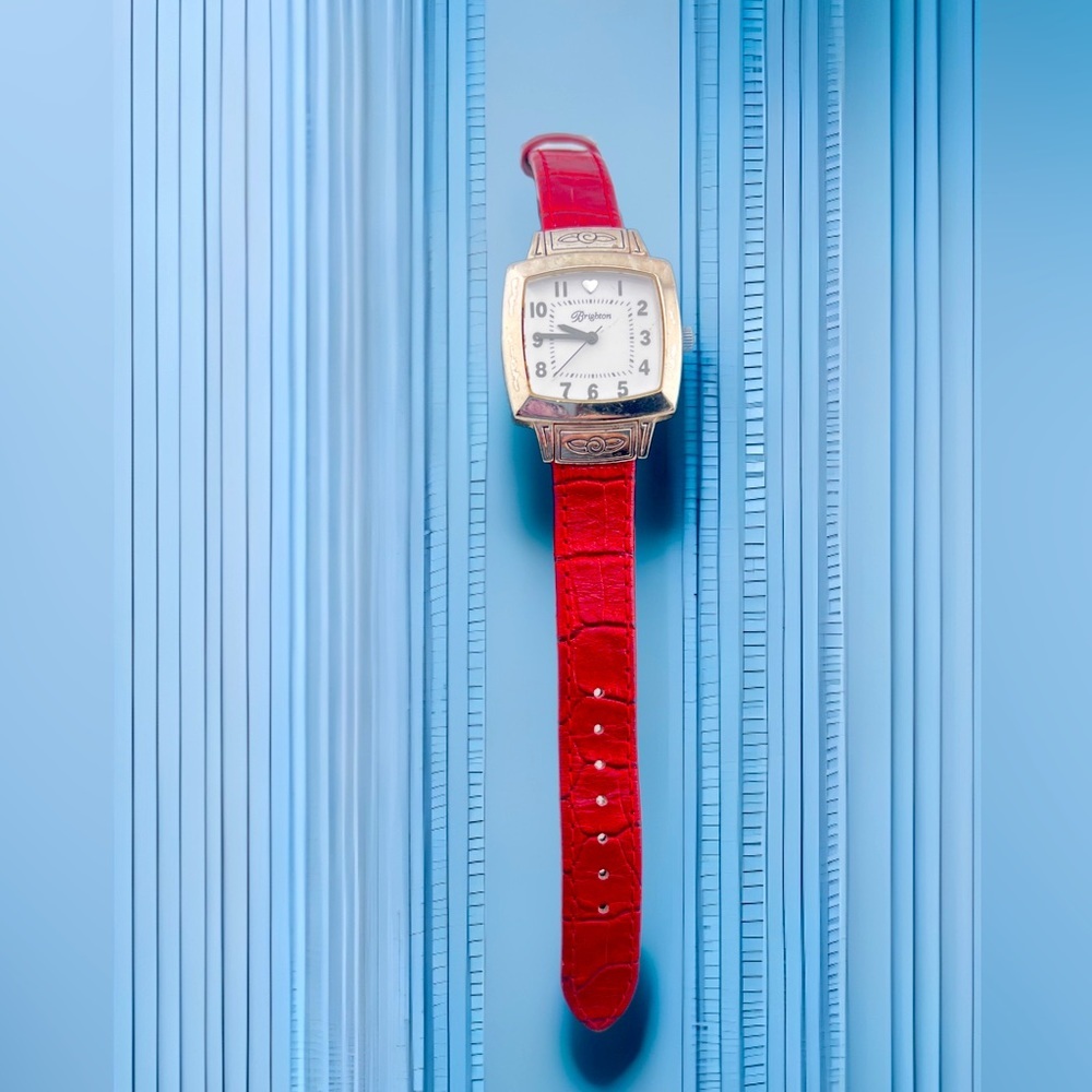 Brighton Orchard Watch with Red Leather Band. Beautiful scrolling on the outside